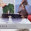 CARTIER C DE RIMLESS NAVIGATOR FRAME SUNGLASSES 548665 IN METAL